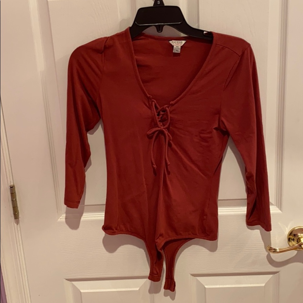guess body suit size medium